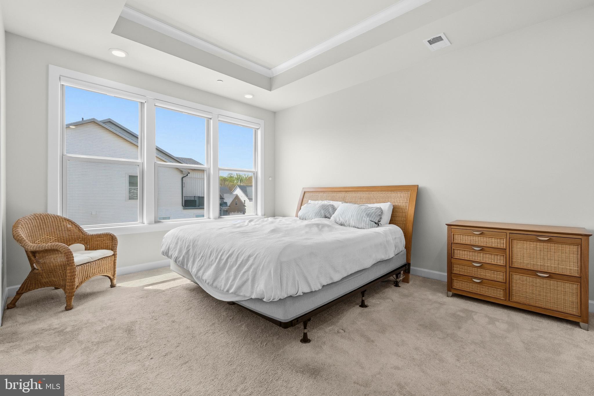 103 Brown Branch Road Laurel, MD 20708 - Photo 16 of 35 a bedroom with a bed and a chair