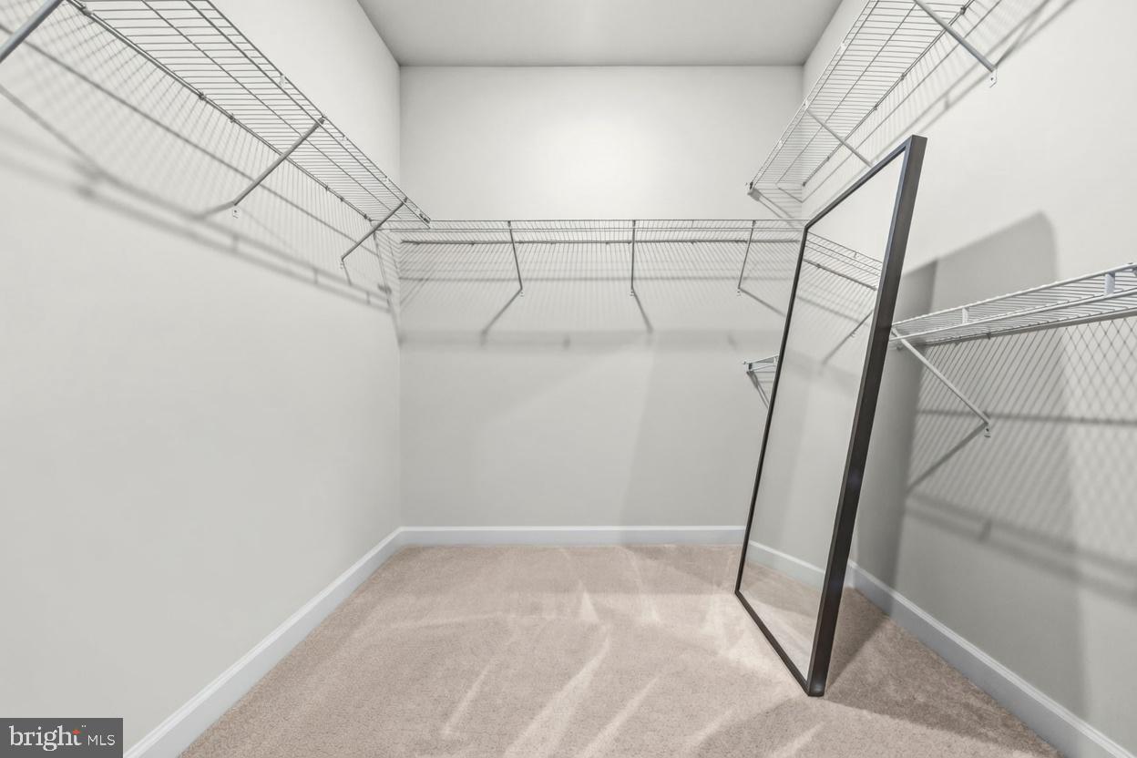 103 Brown Branch Road Laurel, MD 20708 - Photo 18 of 35 a view of a room with racks on the wall