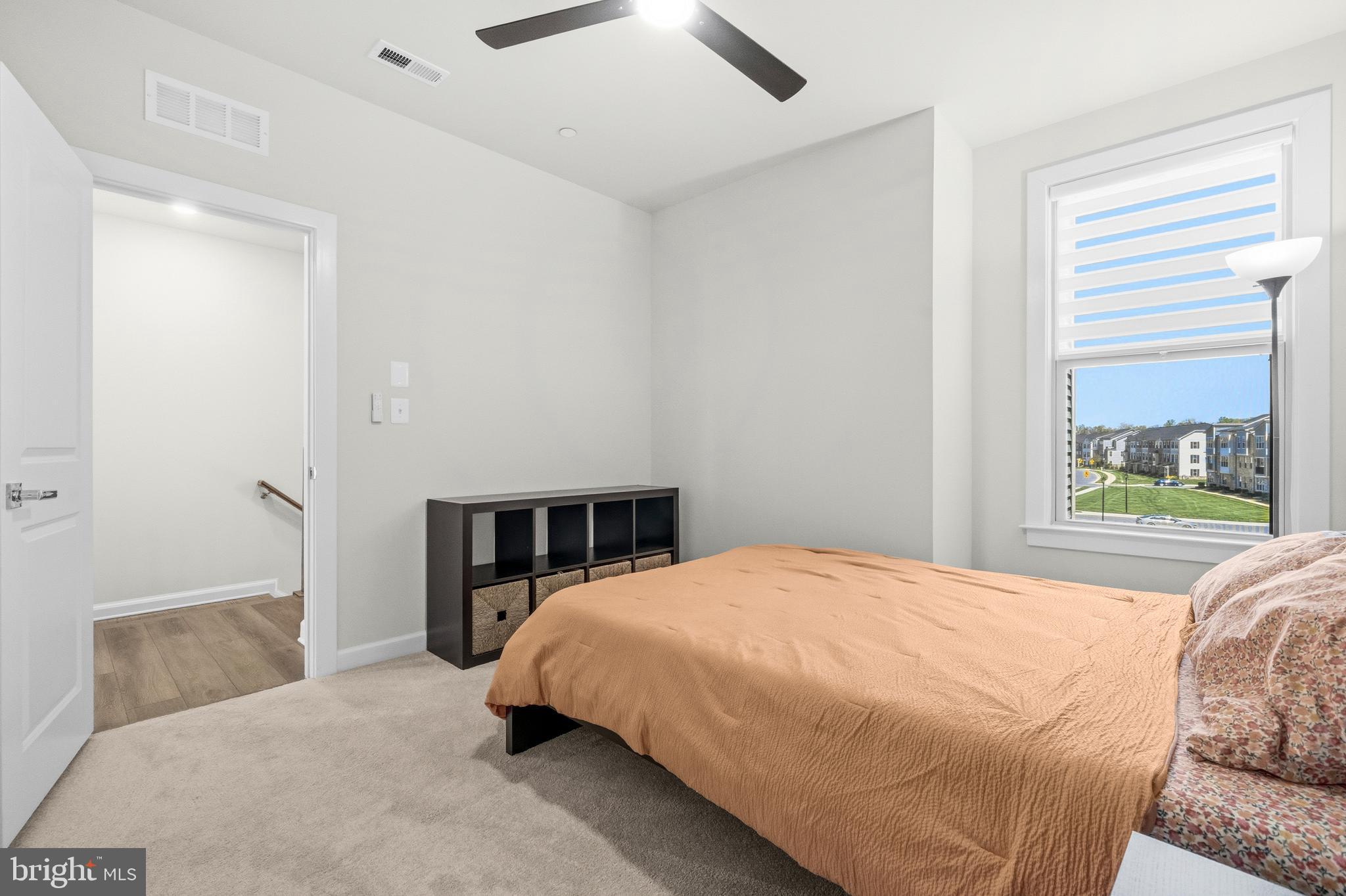 103 Brown Branch Road Laurel, MD 20708 - Photo 22 of 35 a bedroom with a bed and window