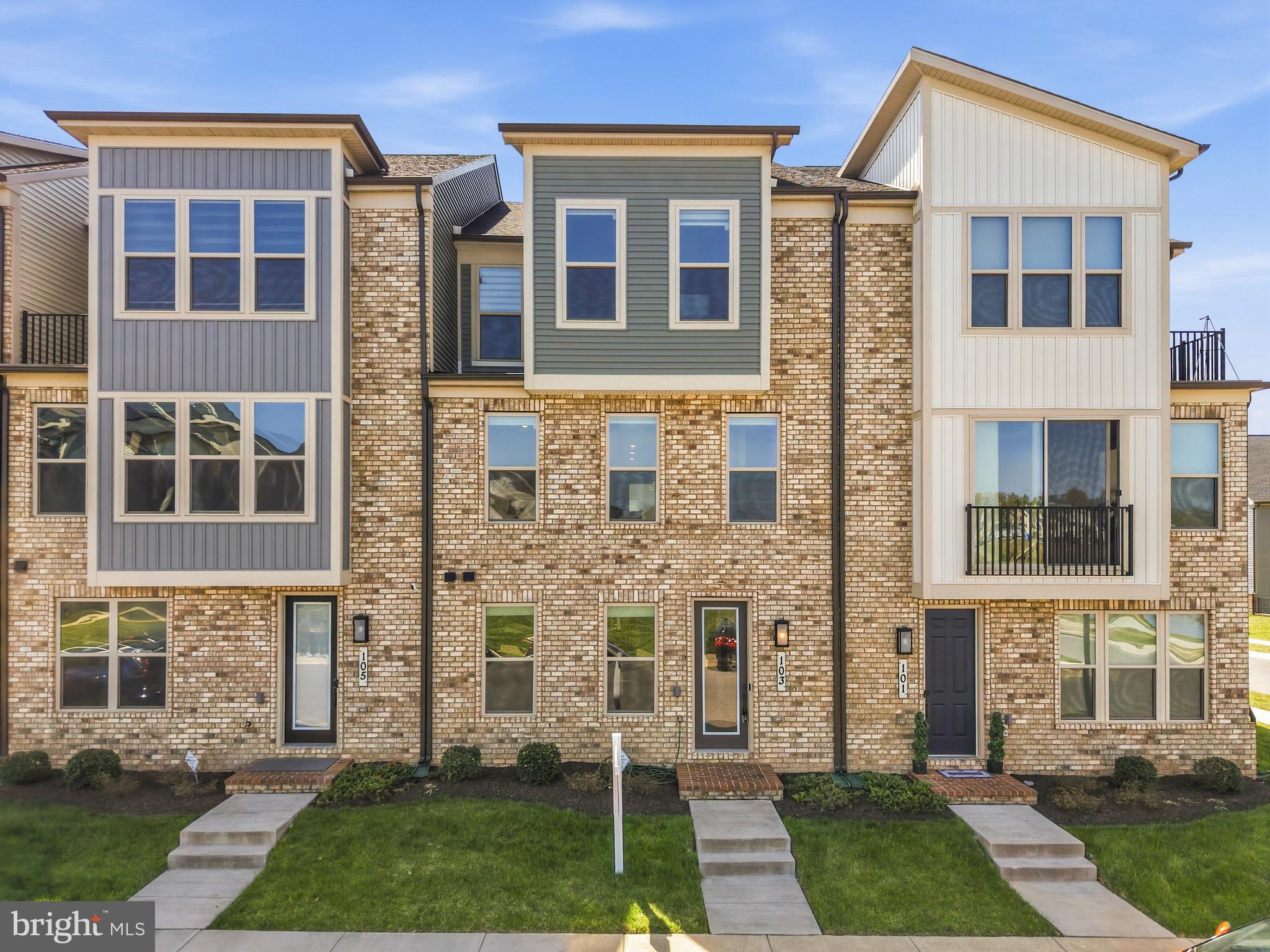 103 Brown Branch Road Laurel, MD 20708 - Photo 5 of 35 a view of a brick building next to a yard