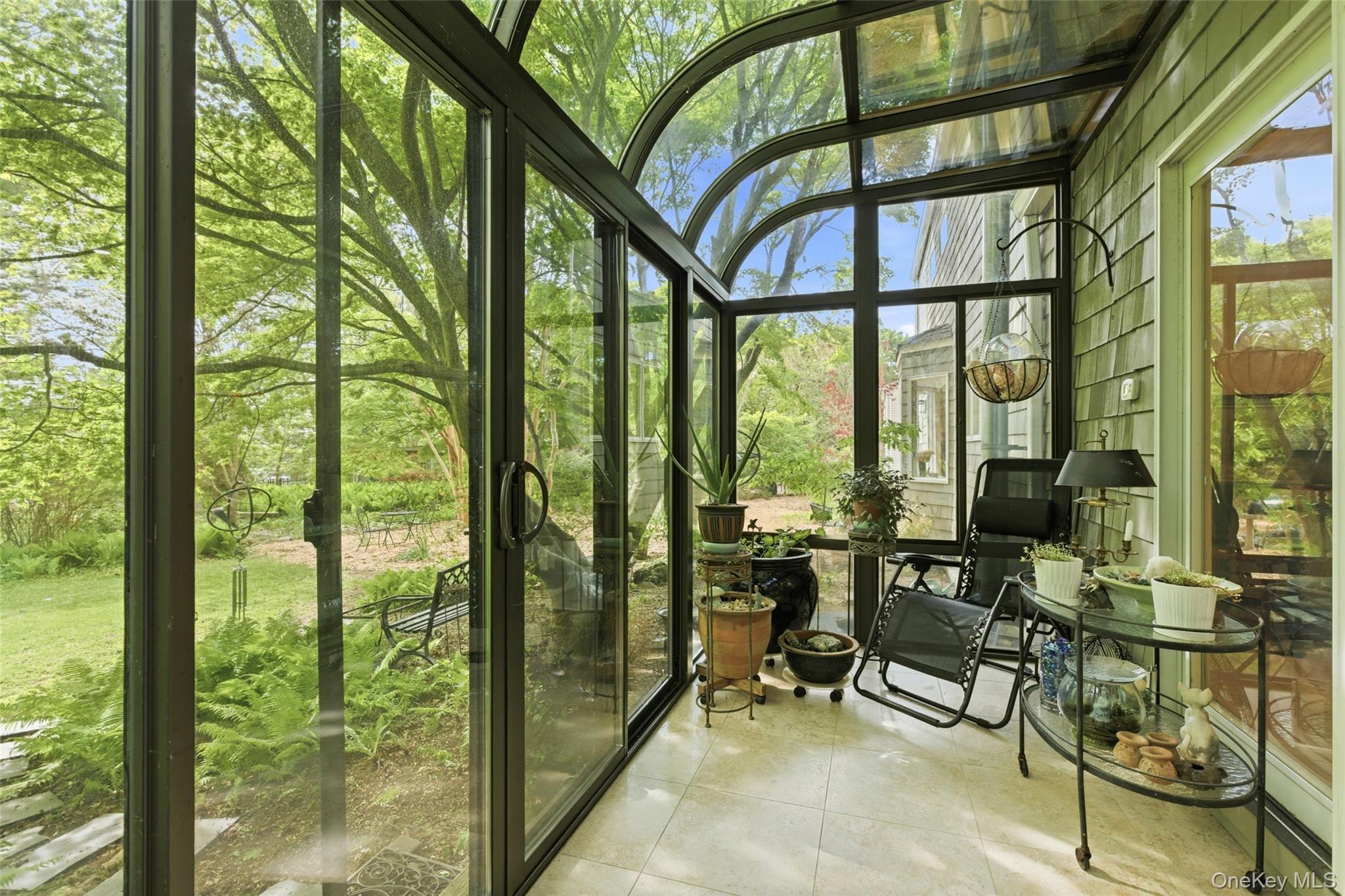 7 Gun Path Setauket, NY 11733 - Photo 11 of 34 a view of living room with furniture and floor to ceiling windows