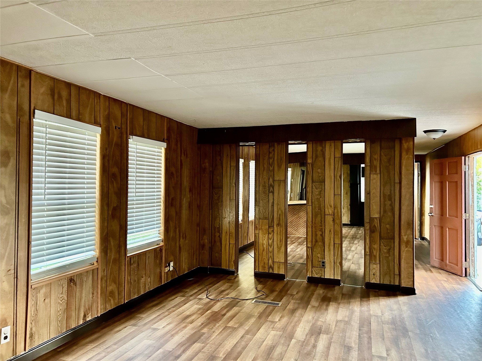 13819 Eagle Pass Street Houston, TX 77015 - Photo 3 of 9 a view of a room with wooden floor and stairs