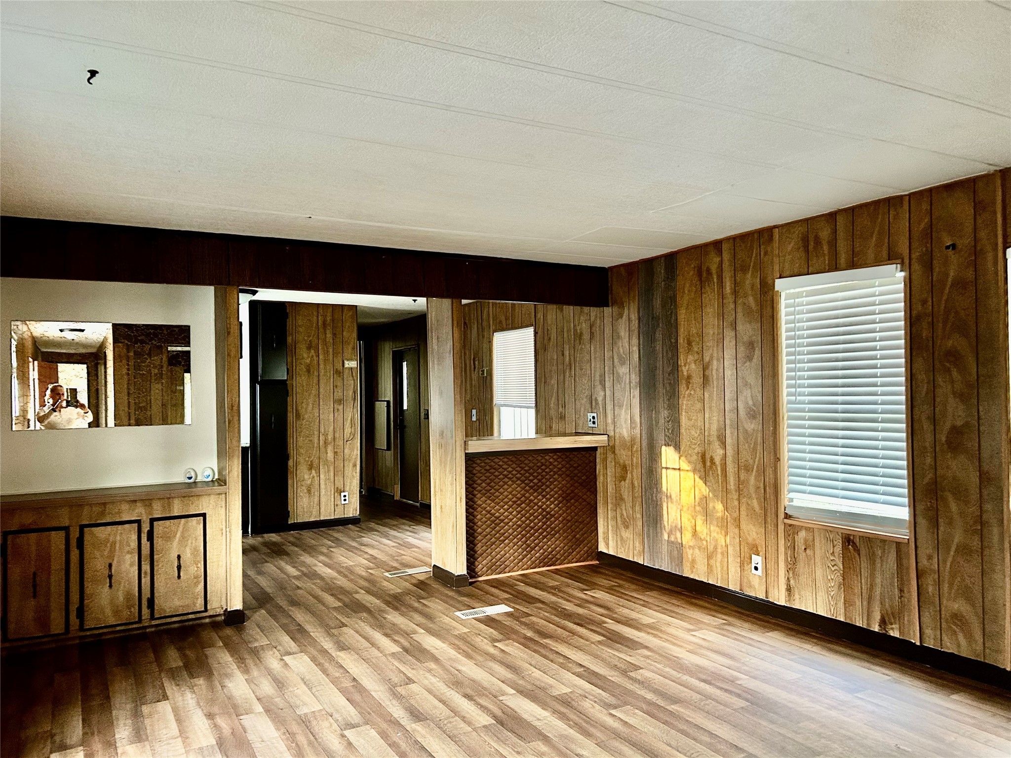 13819 Eagle Pass Street Houston, TX 77015 - Photo 5 of 9 a view of a livingroom with wooden floor and a staircase