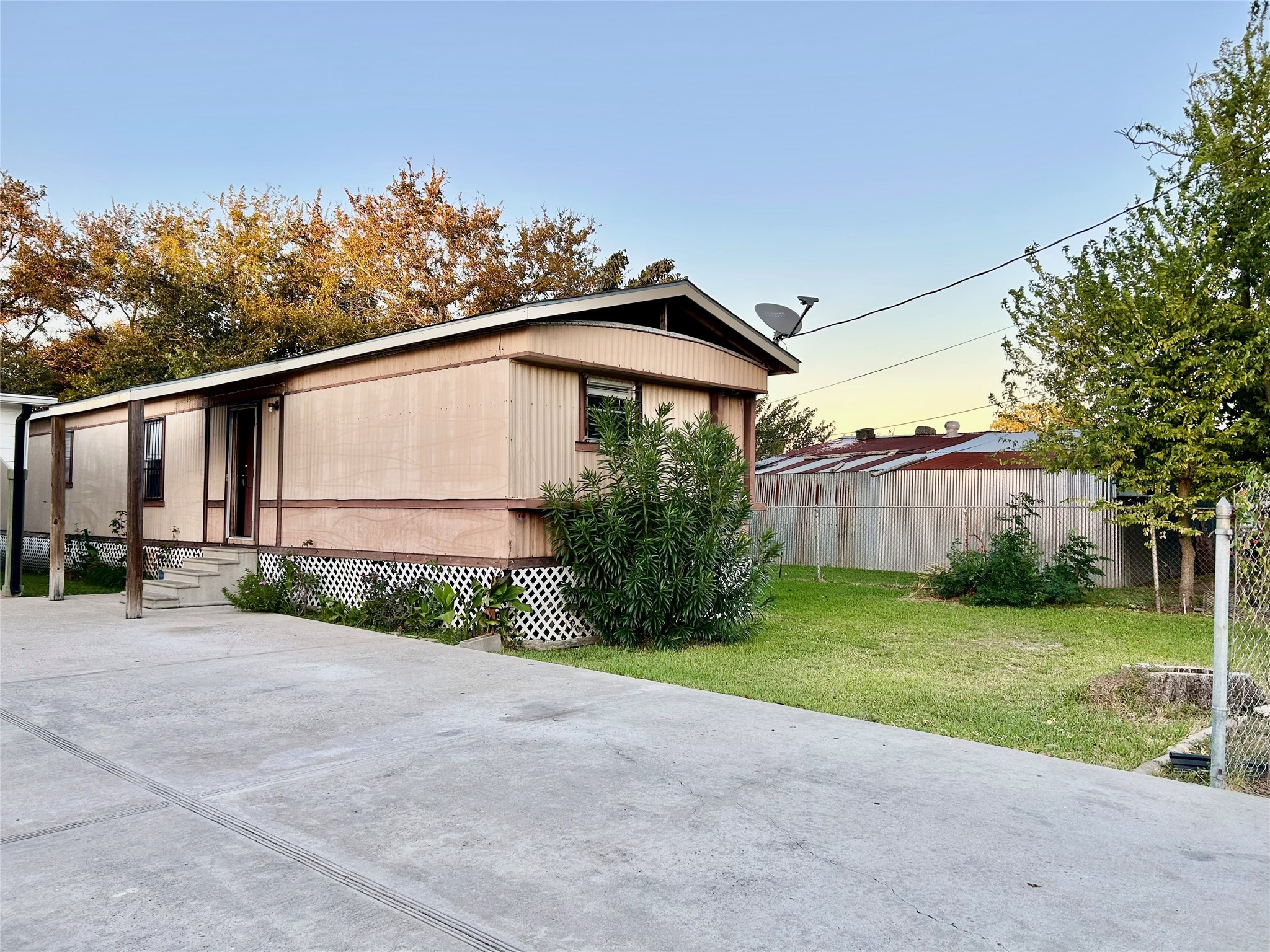 13819 Eagle Pass Street Houston, TX 77015 - Photo 8 of 9 a blue house with yard in front of it