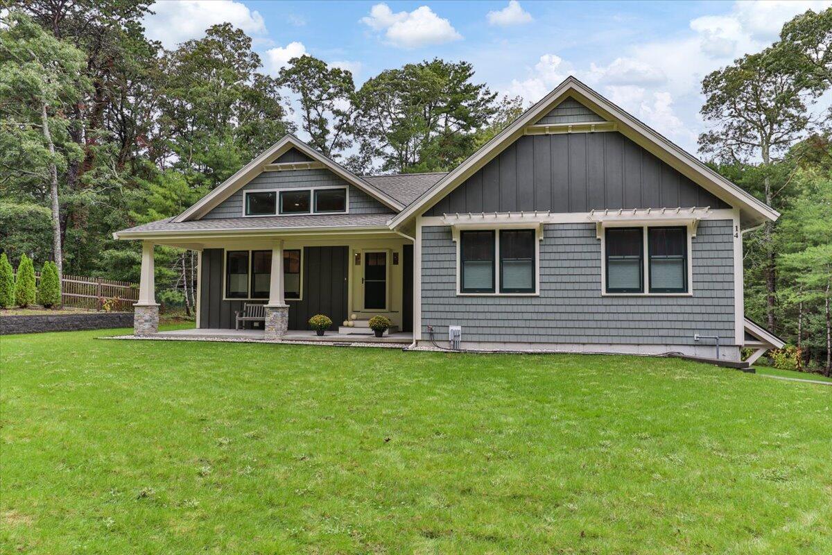 14 Valley Brook Road Centerville, MA 02632 - Photo 1 of 47 front view of a house with a yard