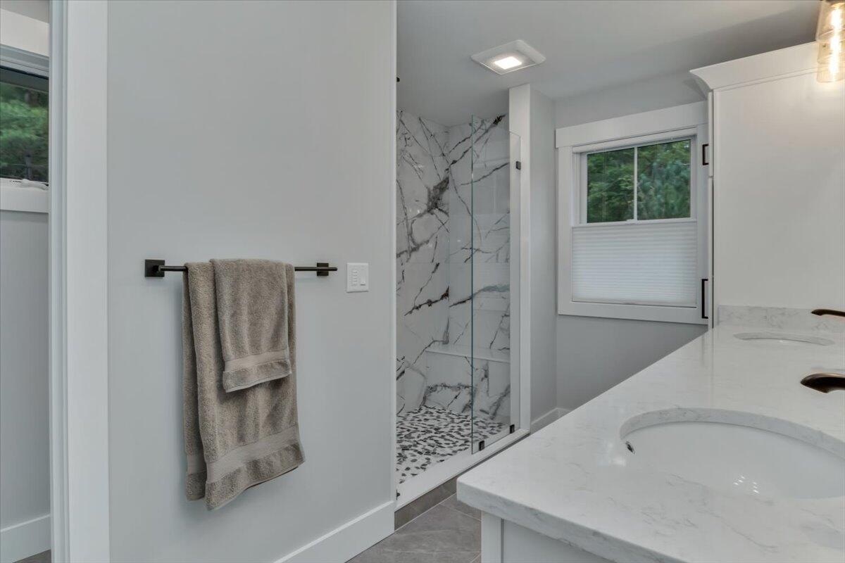 14 Valley Brook Road Centerville, MA 02632 - Photo 23 of 47 a bathroom with a bathtub and a shower