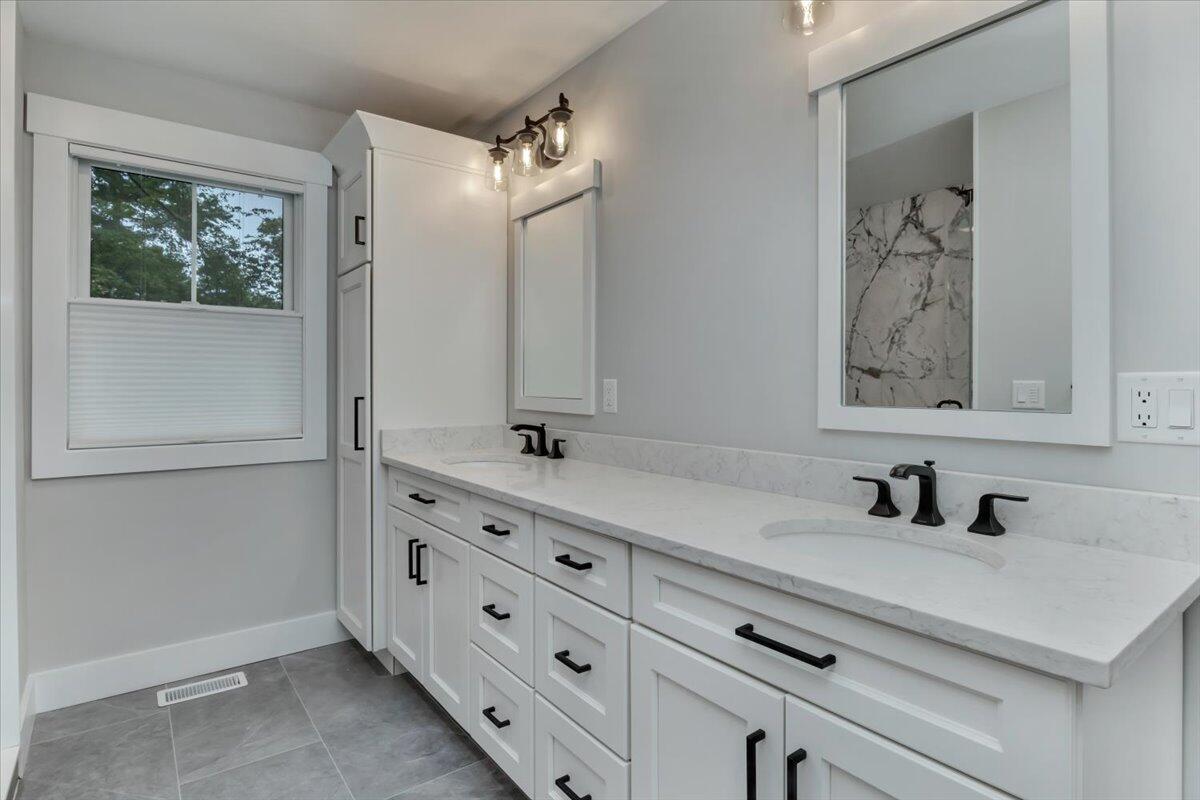14 Valley Brook Road Centerville, MA 02632 - Photo 24 of 47 a bathroom with a sink and a mirror
