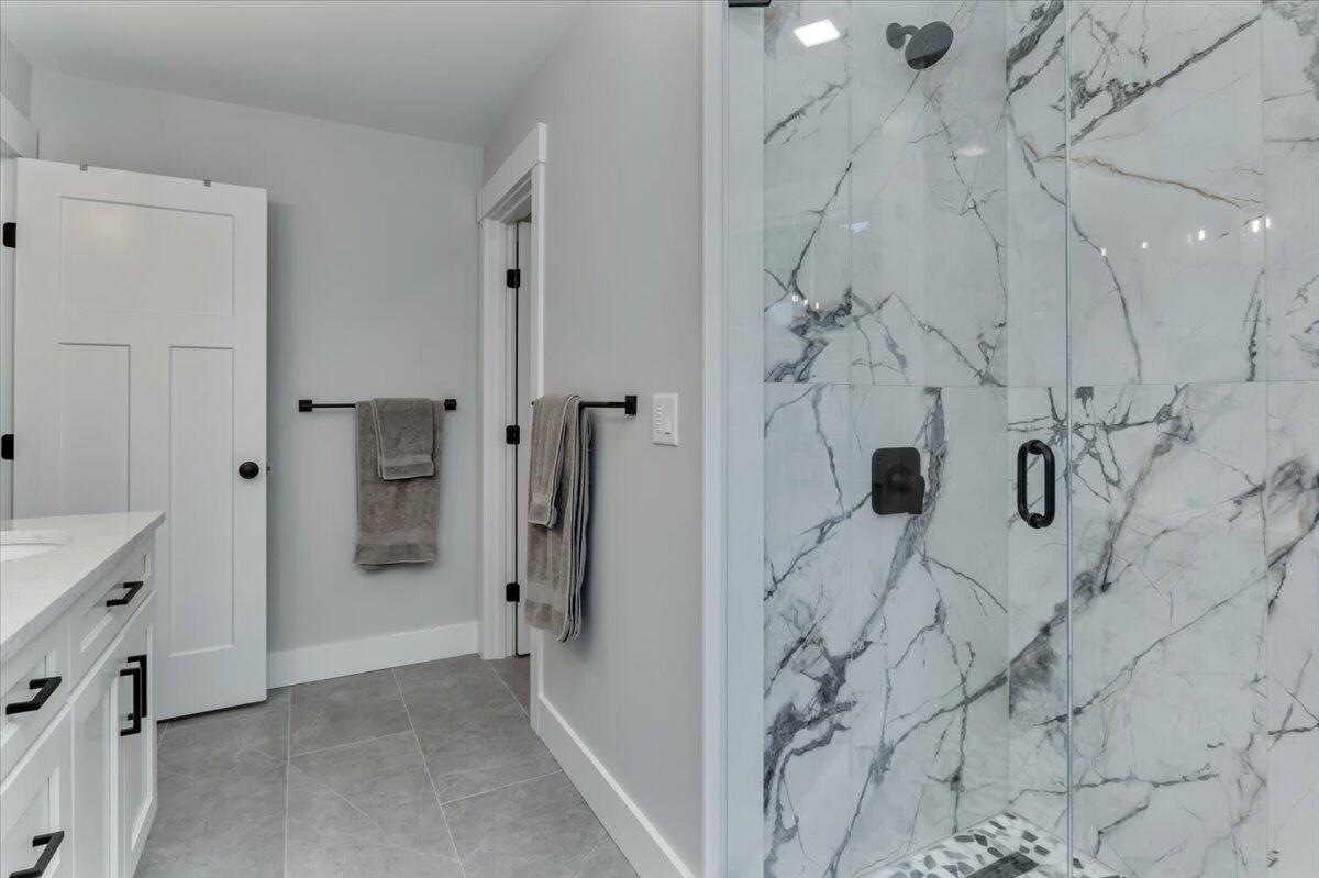 14 Valley Brook Road Centerville, MA 02632 - Photo 25 of 47 a bathroom with a bathtub and shower