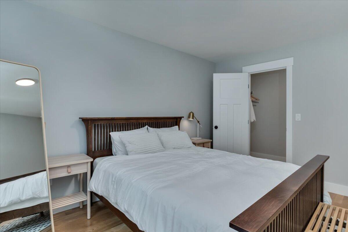 14 Valley Brook Road Centerville, MA 02632 - Photo 28 of 47 a bedroom with a bed and a table