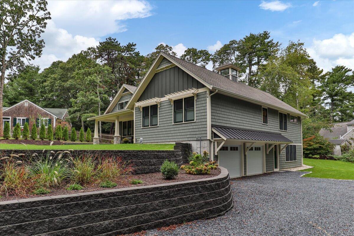 14 Valley Brook Road Centerville, MA 02632 - Photo 3 of 47 a front view of a house with porch