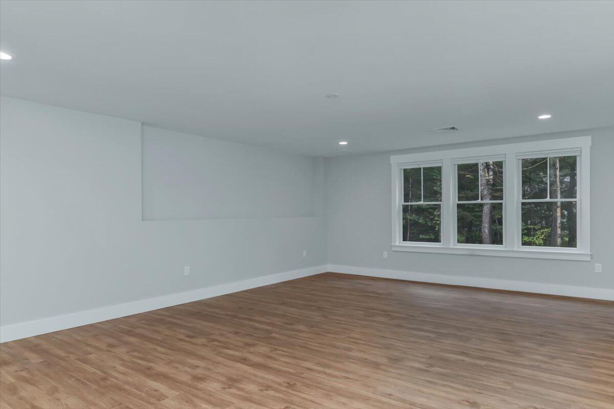 14 Valley Brook Road Centerville, MA 02632 - Photo 37 of 47 a view of an empty room with wooden floor and a window