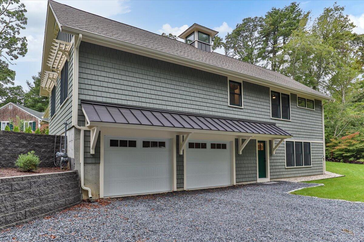 14 Valley Brook Road Centerville, MA 02632 - Photo 39 of 47 a front view of a house with garden