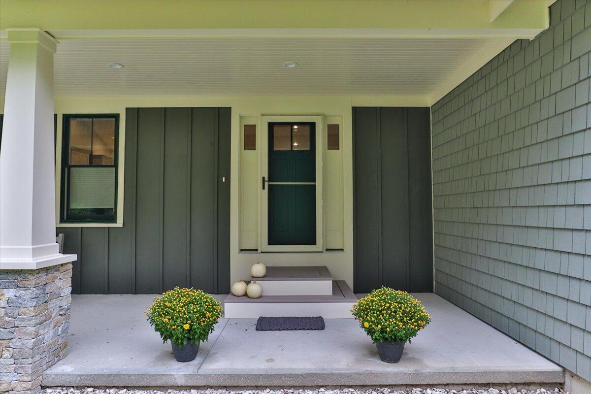 14 Valley Brook Road Centerville, MA 02632 - Photo 4 of 47 a front view of a house with entryway