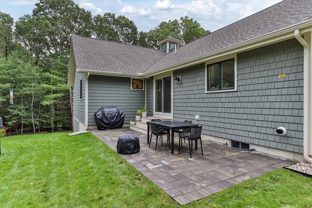 14 Valley Brook Road Centerville, MA 02632 - Photo 44 of 47 a view of an outdoor sitting area with chairs