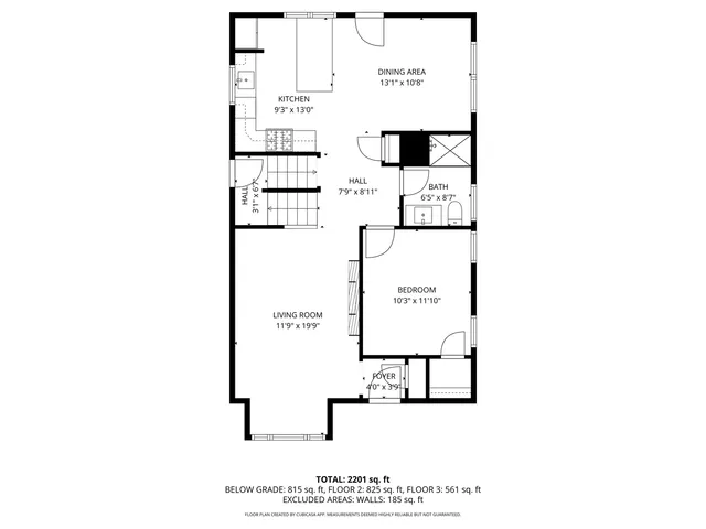 a picture of a bench in front of a wall