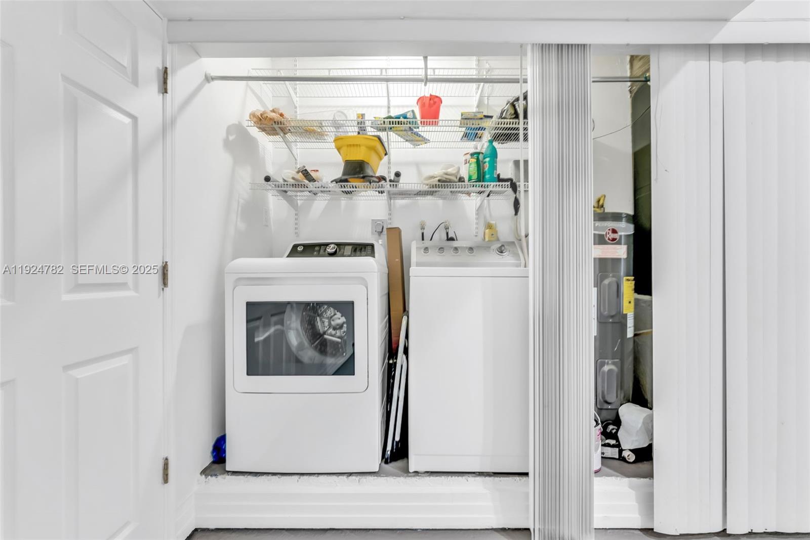11525 Southwest 135th Court Miami, FL 33186 - Photo 27 of 42 a utility room with washer and dryer