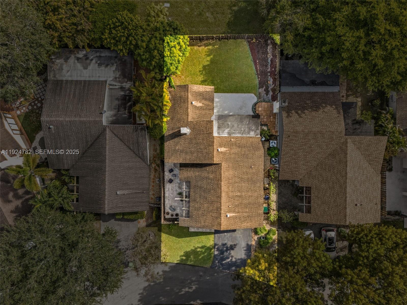 11525 Southwest 135th Court Miami, FL 33186 - Photo 42 of 42 an aerial view of a house with a yard