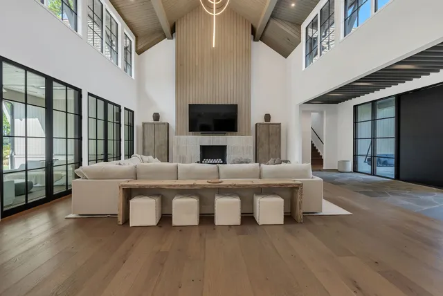 a kitchen with stainless steel appliances granite countertop a sink and a refrigerator