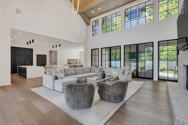 a bathroom with a double vanity sink a mirror and shower