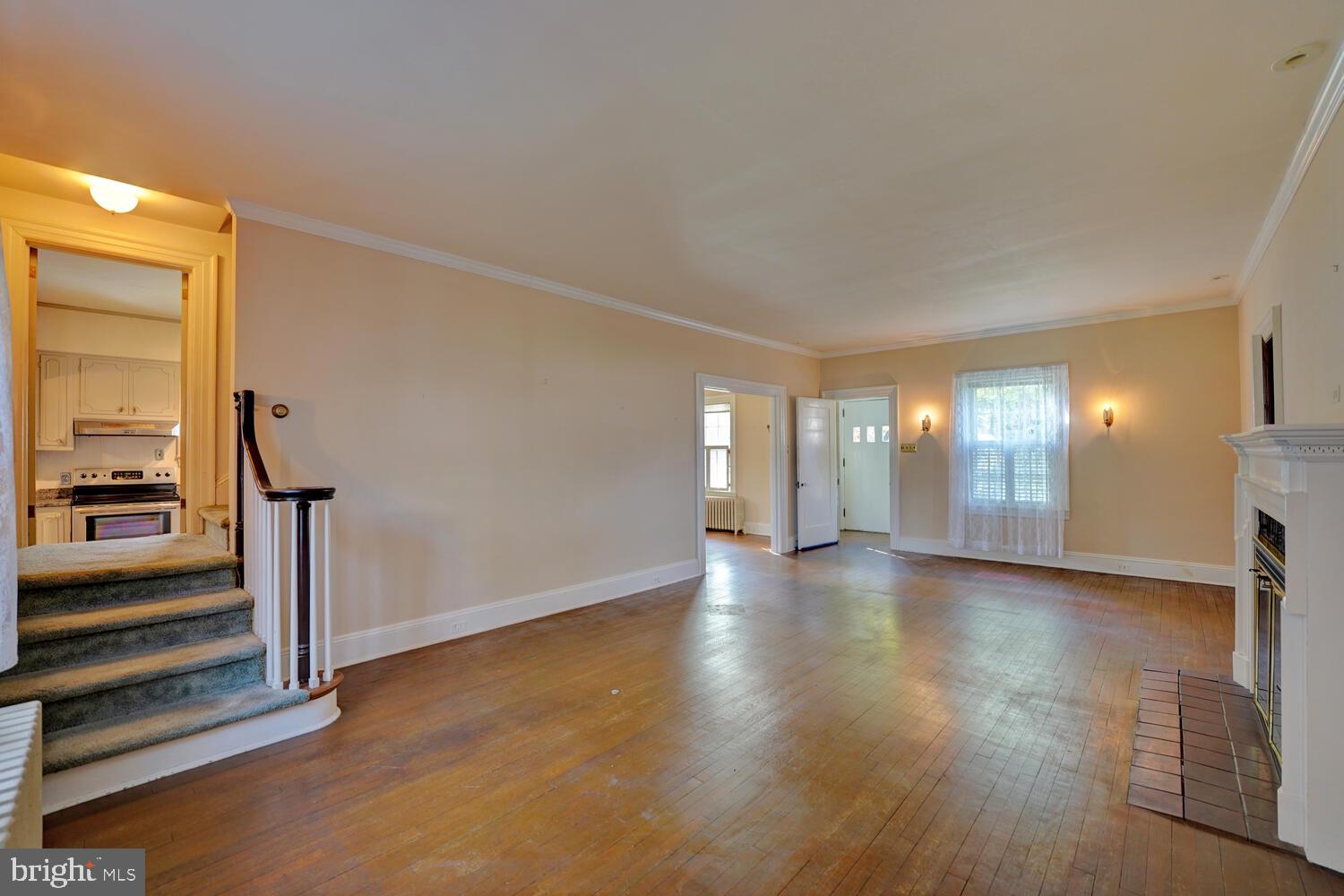 21 Hazel Road Dover, DE 19901 - Photo 11 of 69 an empty room with wooden floor and windows