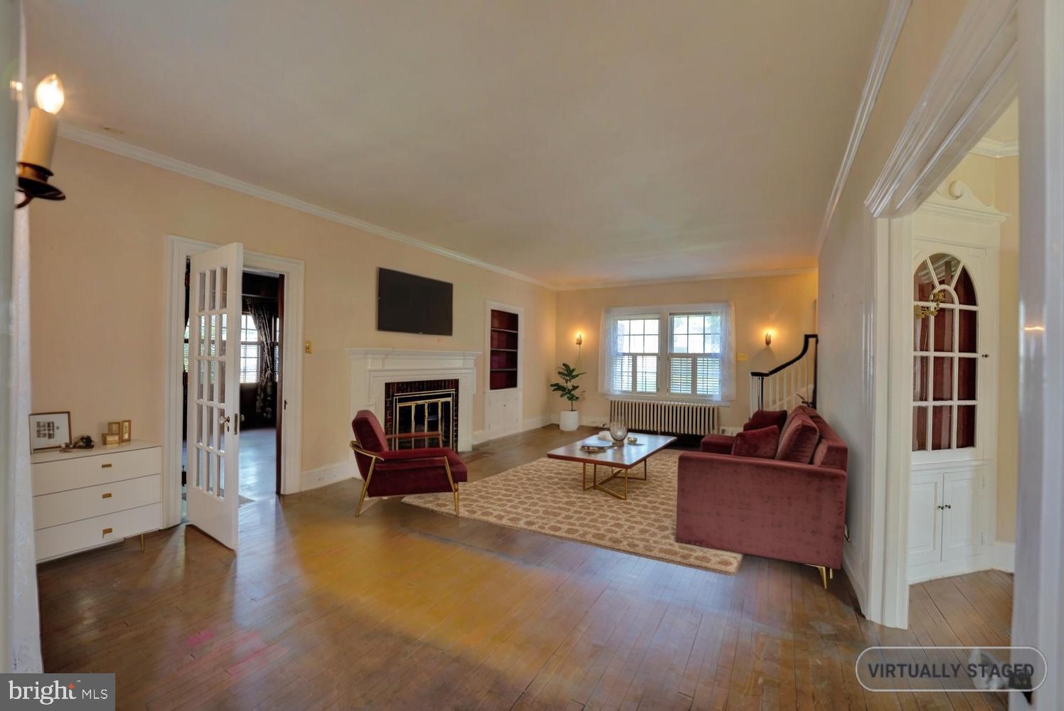 21 Hazel Road Dover, DE 19901 - Photo 13 of 69 a living room with furniture and a fireplace