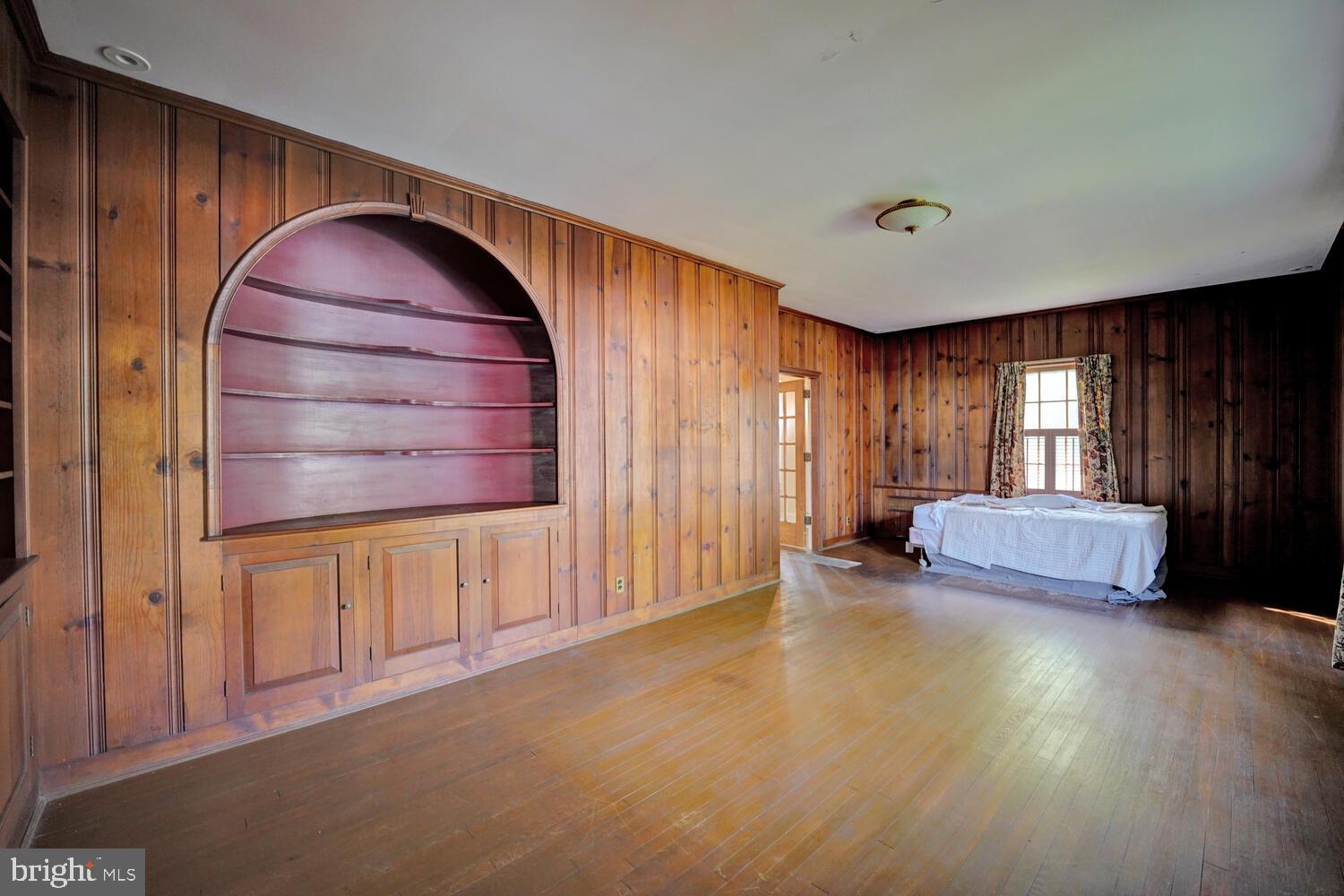 21 Hazel Road Dover, DE 19901 - Photo 17 of 69 wooden floor in an empty room with a window