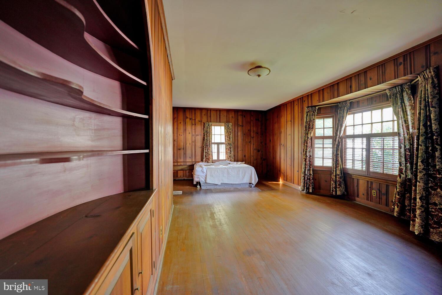 21 Hazel Road Dover, DE 19901 - Photo 18 of 69 a view of a bedroom with furniture wooden floor and window