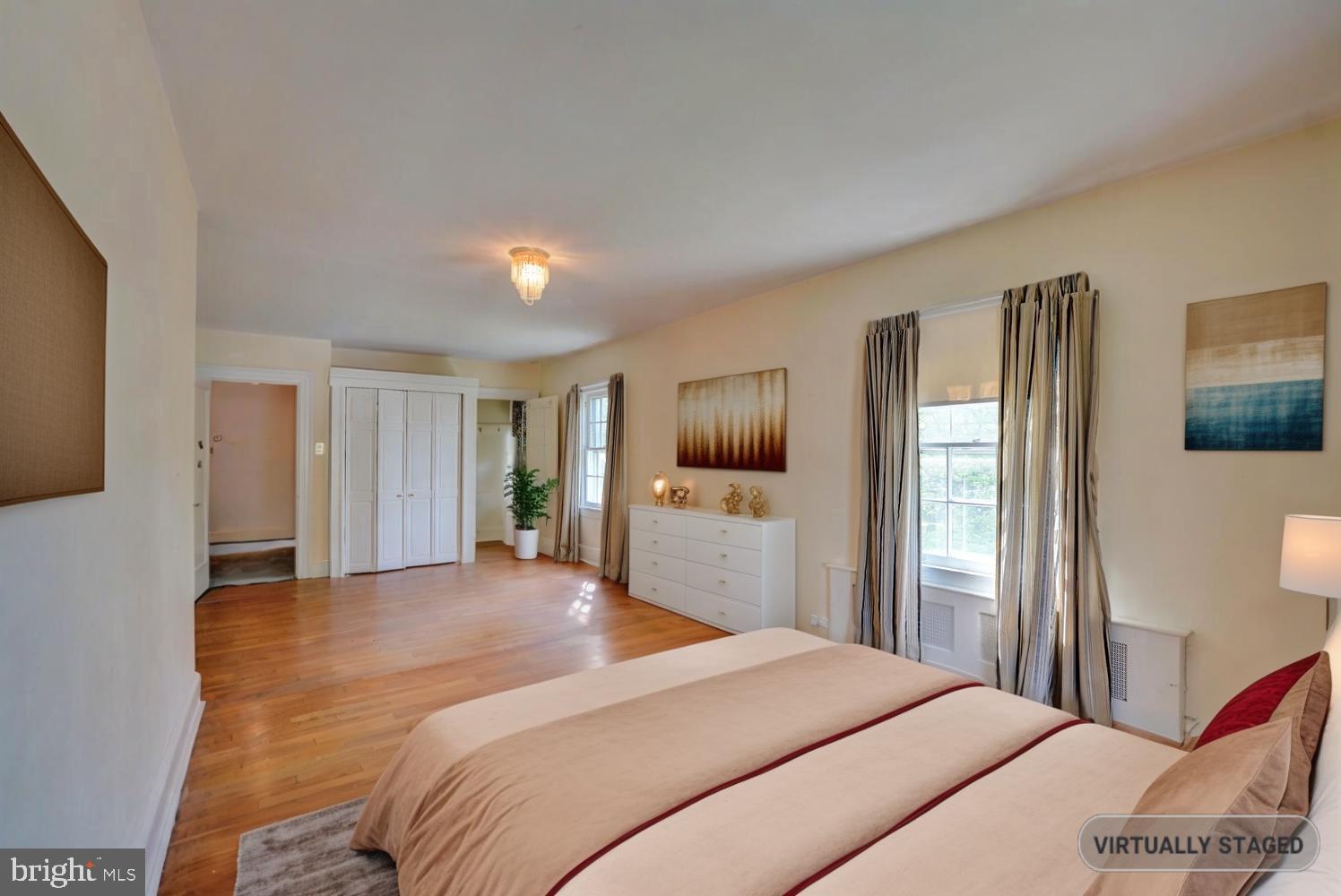 21 Hazel Road Dover, DE 19901 - Photo 34 of 69 a bedroom with a large bed and a flat screen tv