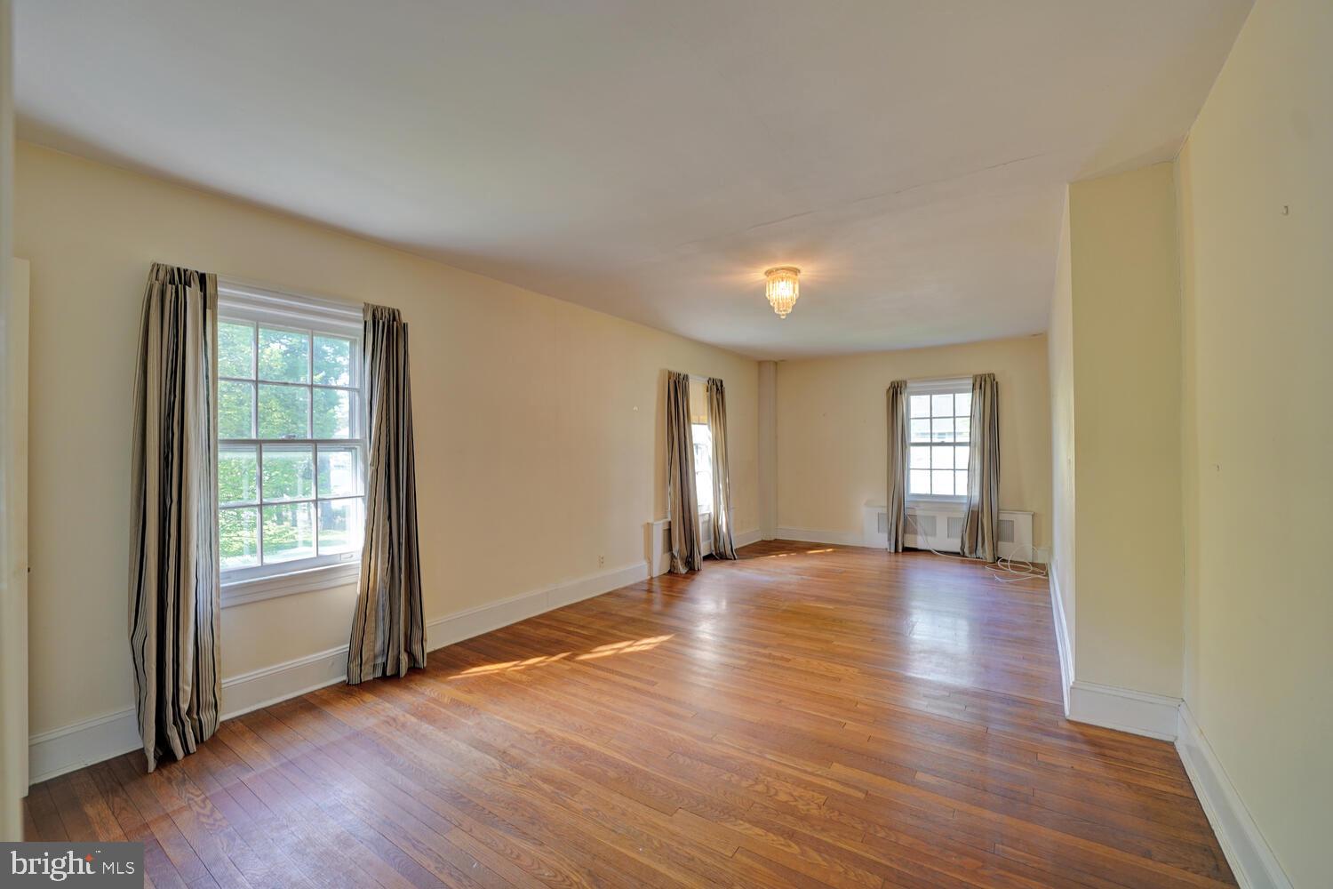21 Hazel Road Dover, DE 19901 - Photo 36 of 69 an empty room with wooden floor and windows