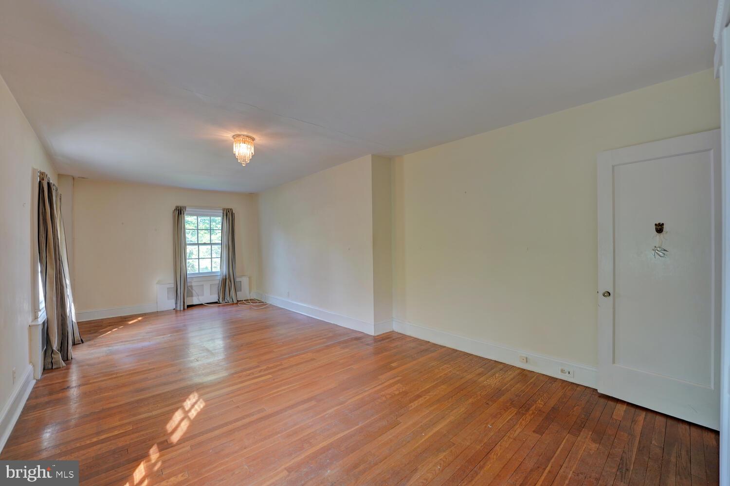 21 Hazel Road Dover, DE 19901 - Photo 37 of 69 a view of empty room with window and wooden floor