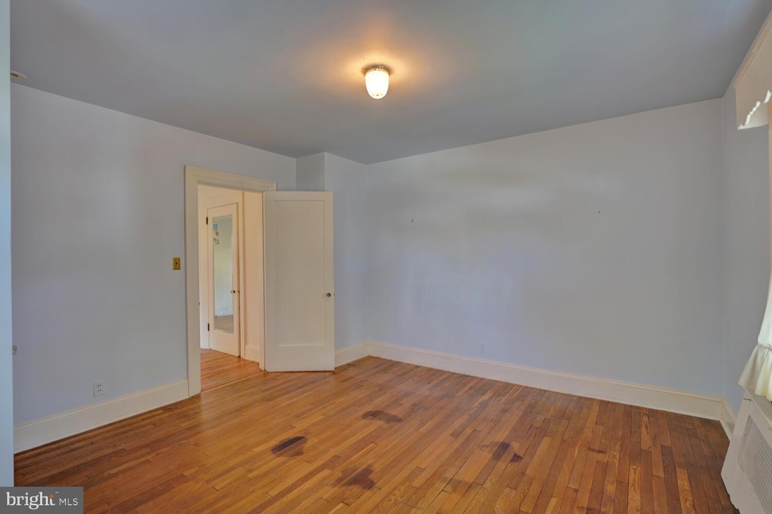 21 Hazel Road Dover, DE 19901 - Photo 47 of 69 a view of empty room with wooden floor