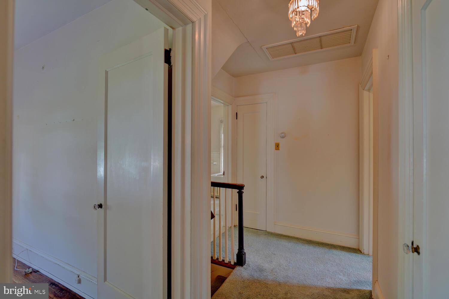 21 Hazel Road Dover, DE 19901 - Photo 52 of 69 a view of a hallway with staircase