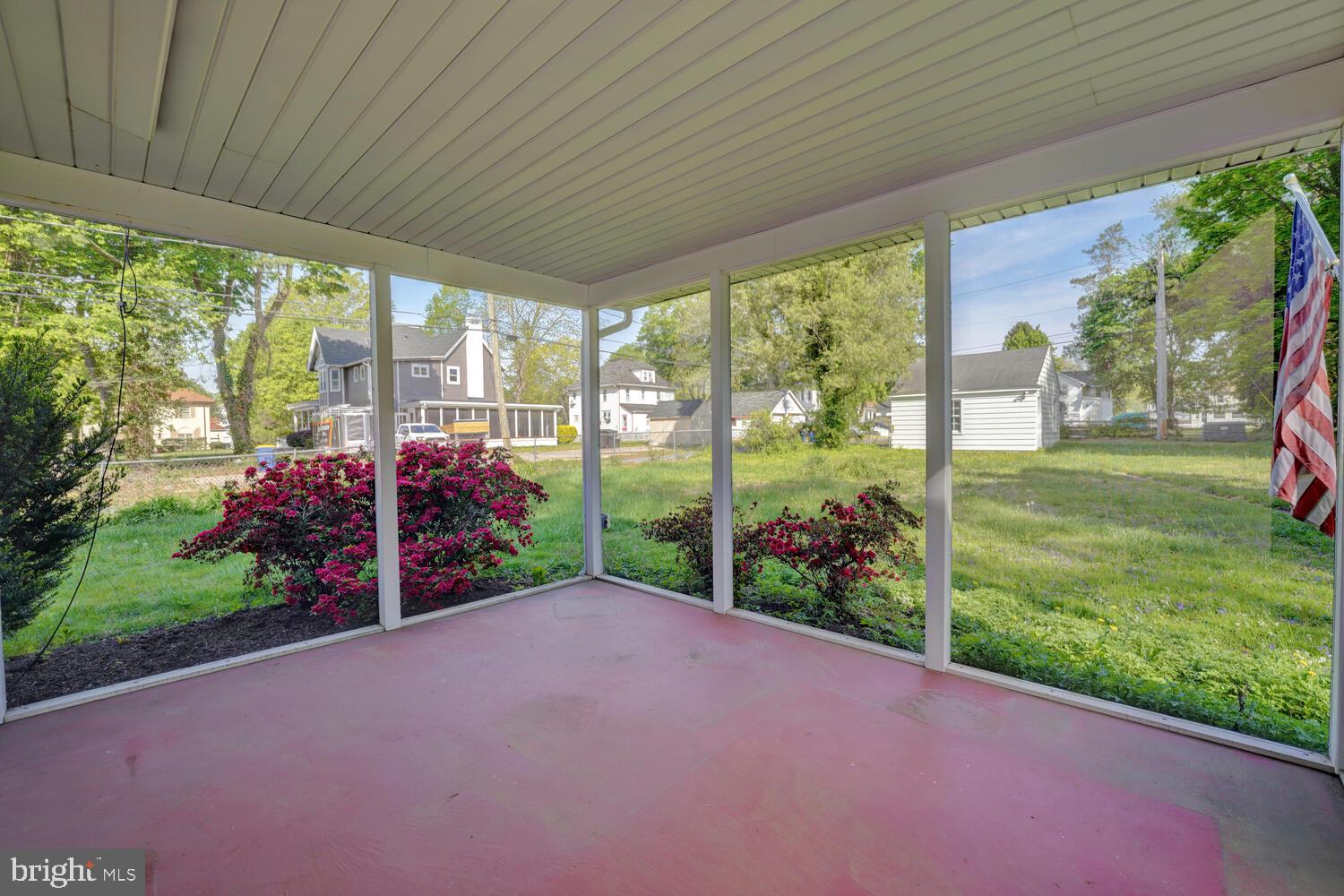 21 Hazel Road Dover, DE 19901 - Photo 57 of 69 a view of a backyard with garden and plants