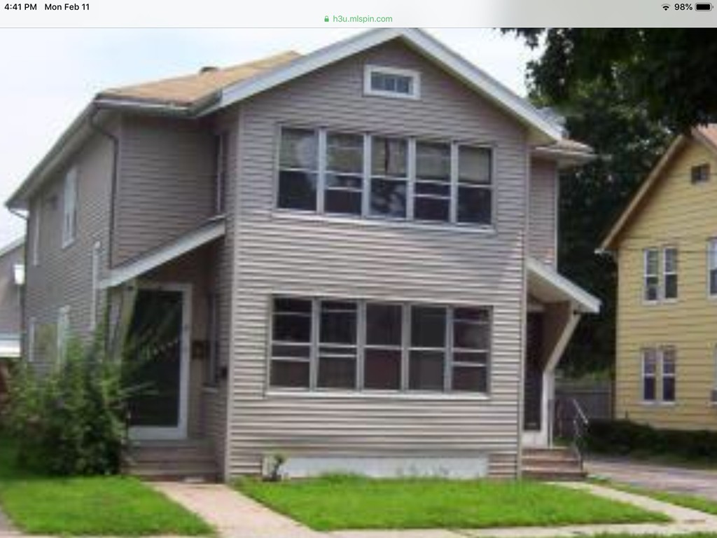 43-45 Jenness Street Springfield, MA 01104 - Photo 1 of 21 a front view of a house with a yard