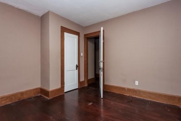 43-45 Jenness Street Springfield, MA 01104 - Photo 20 of 21 a view of an empty room with wooden floor and closet
