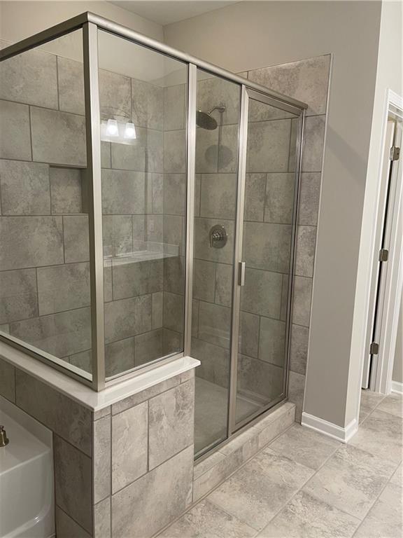 500 Duval Drive Alpharetta, GA 30009 - Photo 13 of 21 a bathroom with a shower and a sink