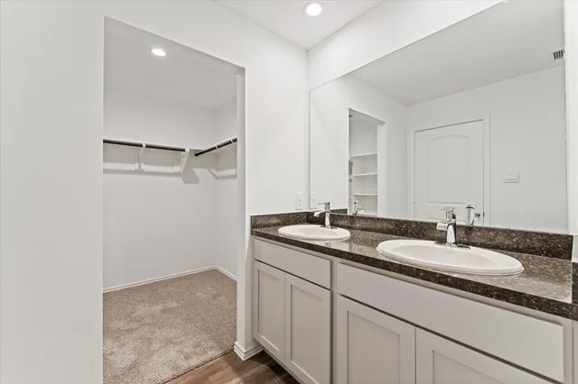 a view of an empty walk in closet