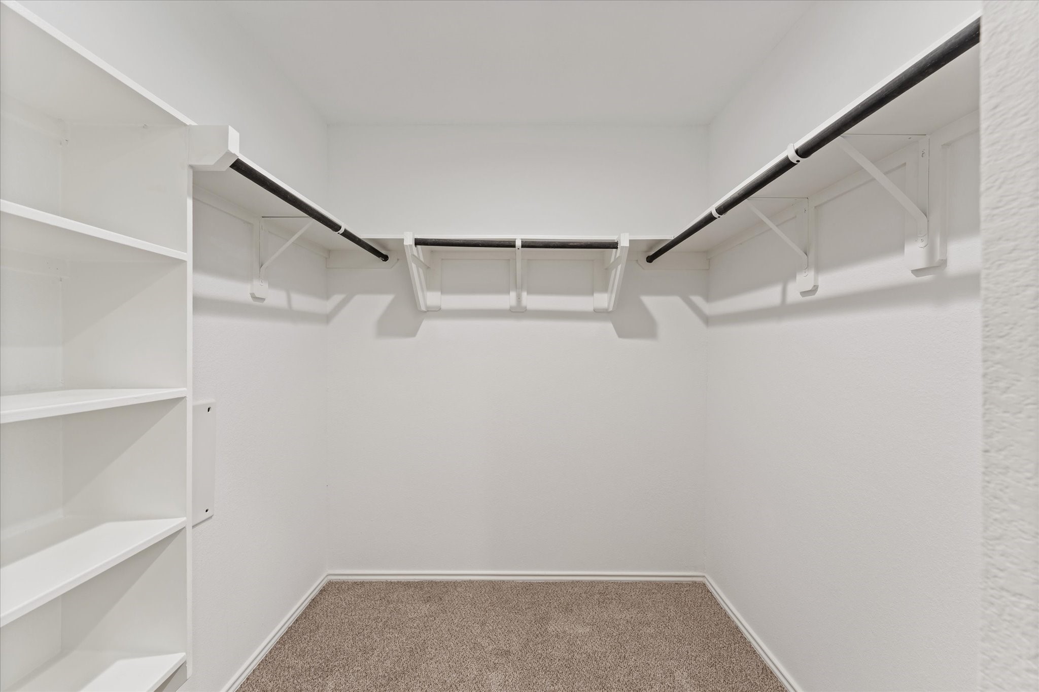 24210 Sandstone Valley Lane Spring, TX 77373 - Photo 21 of 33 a view of an empty walk in closet