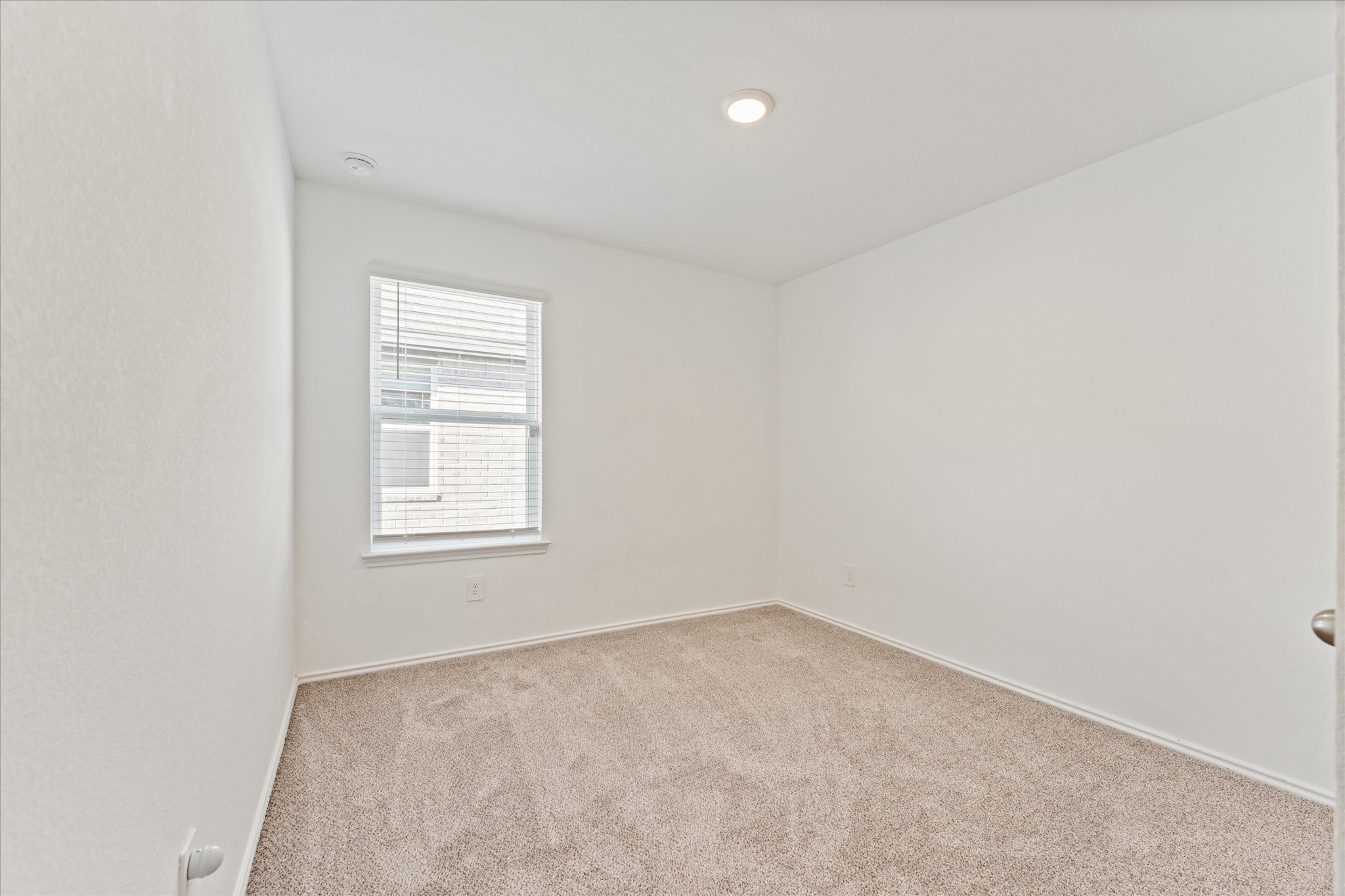 24210 Sandstone Valley Lane Spring, TX 77373 - Photo 26 of 33 an empty room with a window