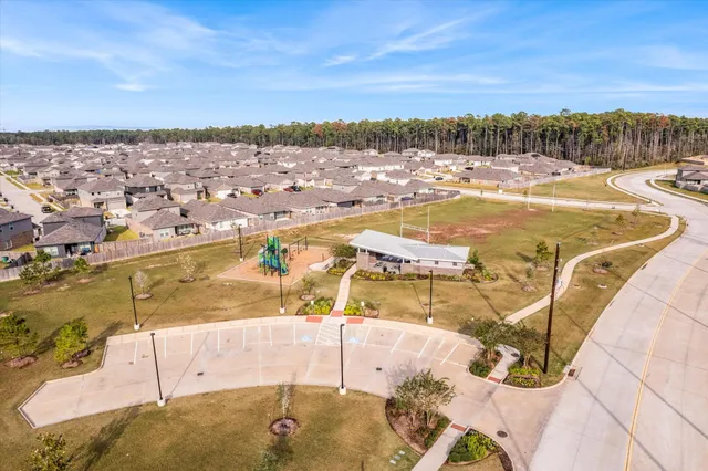 a picture of a bench in front of a wall