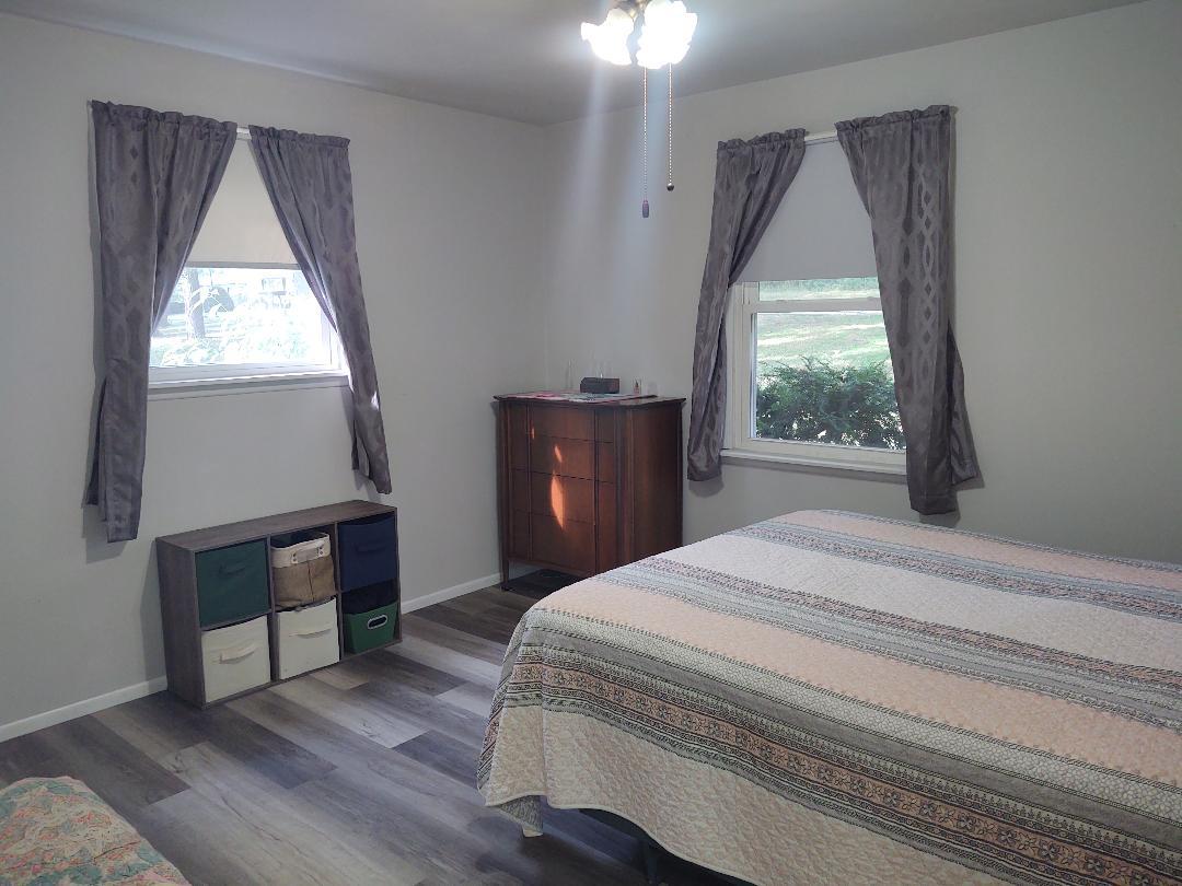 5255 Sand Ridge Road Morris, IL 60450 - Photo 11 of 20 a bedroom with a bed and a window