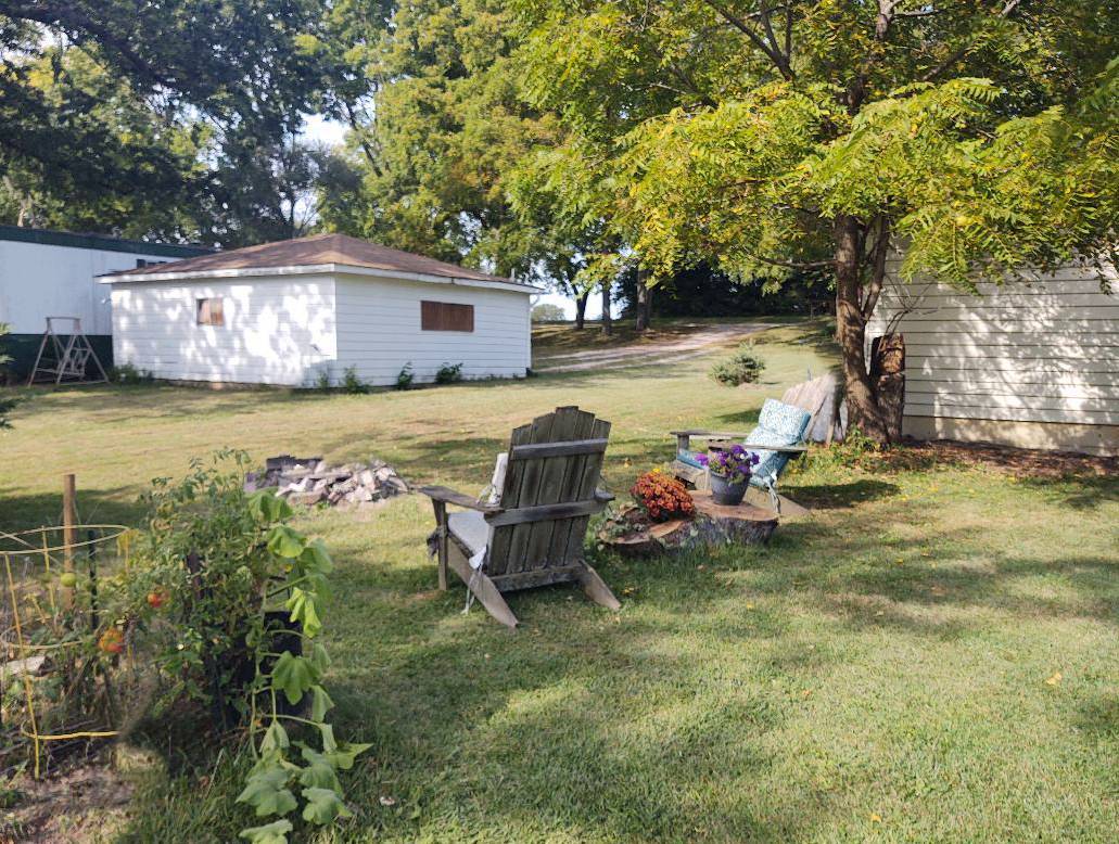 5255 Sand Ridge Road Morris, IL 60450 - Photo 17 of 20 a view of a house with backyard and sitting area