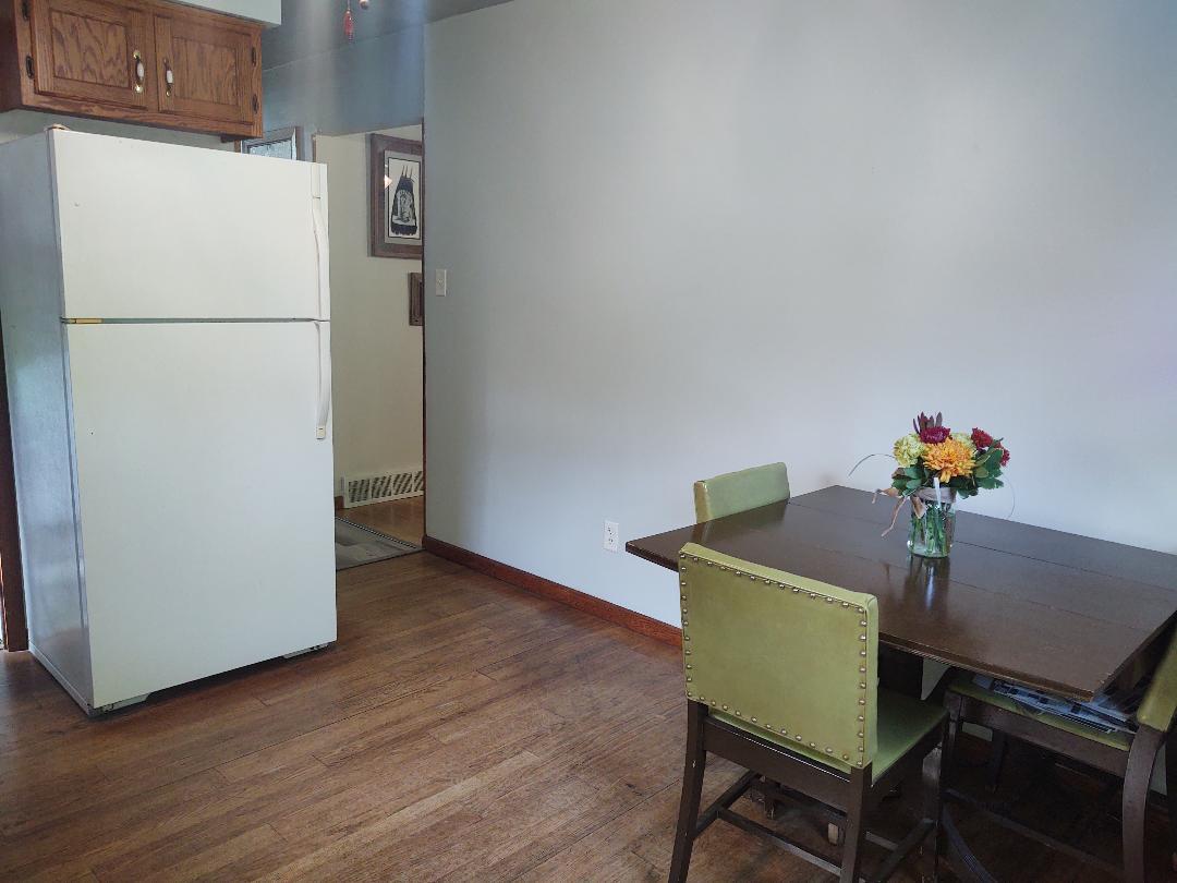 5255 Sand Ridge Road Morris, IL 60450 - Photo 9 of 20 a view of dining room with furniture and wooden floor