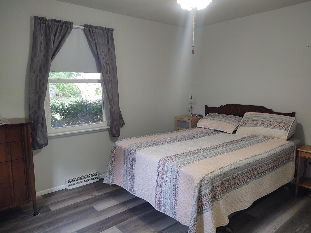 5255 Sand Ridge Road Morris, IL 60450 - Photo 10 of 20 a bedroom with a bed and a window