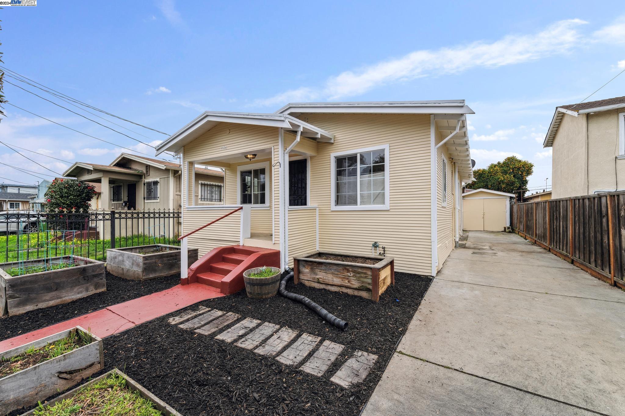 1146 60th Avenue Oakland, CA 94621 - Photo 1 of 1 a front view of a house with patio