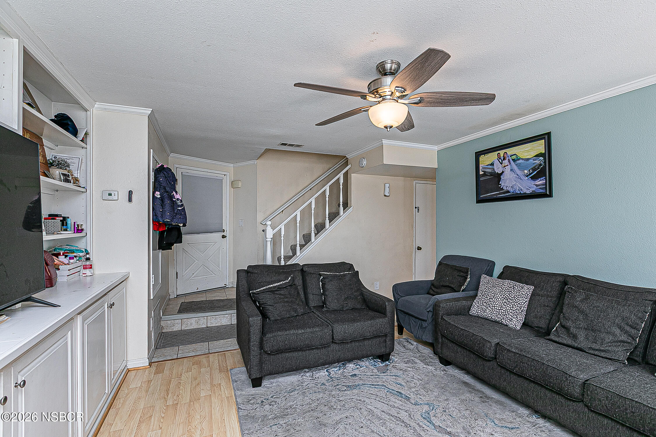 712 Pebble Beach Place Santa Maria, CA 93454 - Photo 6 of 31 a living room with furniture and wooden floor