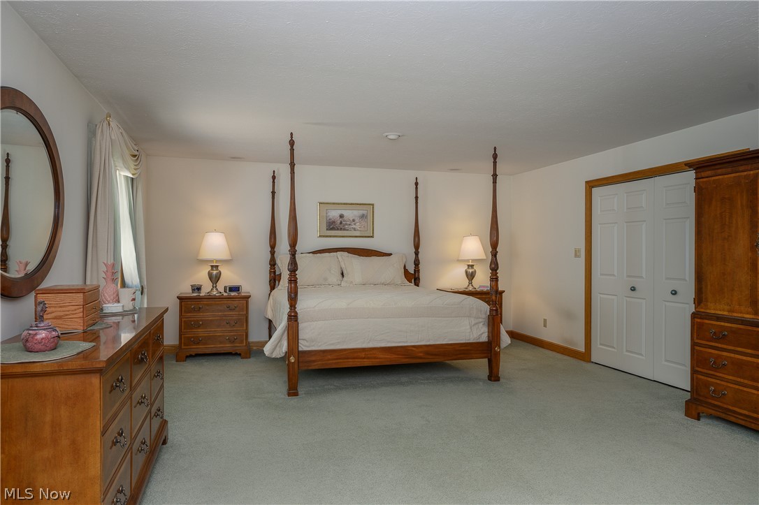 2371 Sunnybrook Road Mogadore, OH 44260 - Photo 16 of 26 Carpeted bedroom with a closet