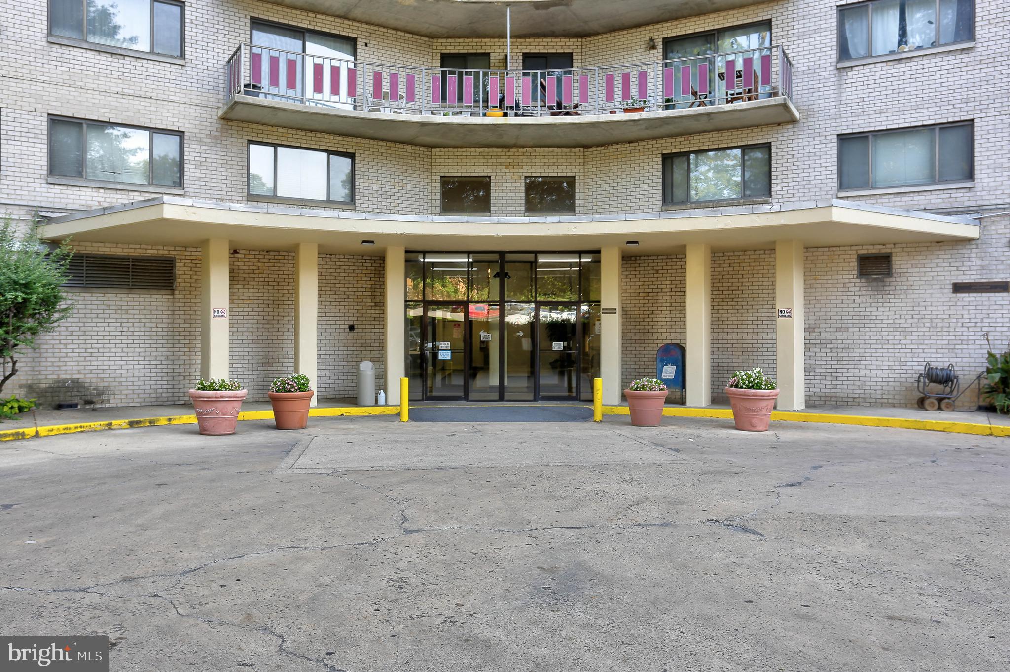 8830 Piney Branch Road, Unit 401 Silver Spring, MD 20903 - Photo 4 of 17 a view of a building with an outdoor space