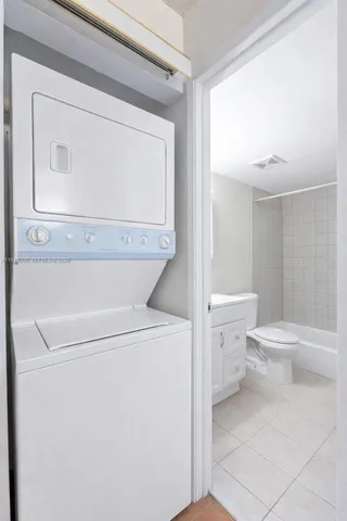 a bathroom with a toilet and a sink