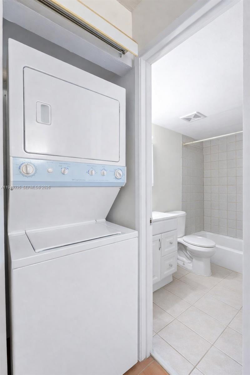 2178 West 60th Street, Unit 18111 Hialeah, FL 33016 - Photo 11 of 17 a bathroom with a toilet and a sink